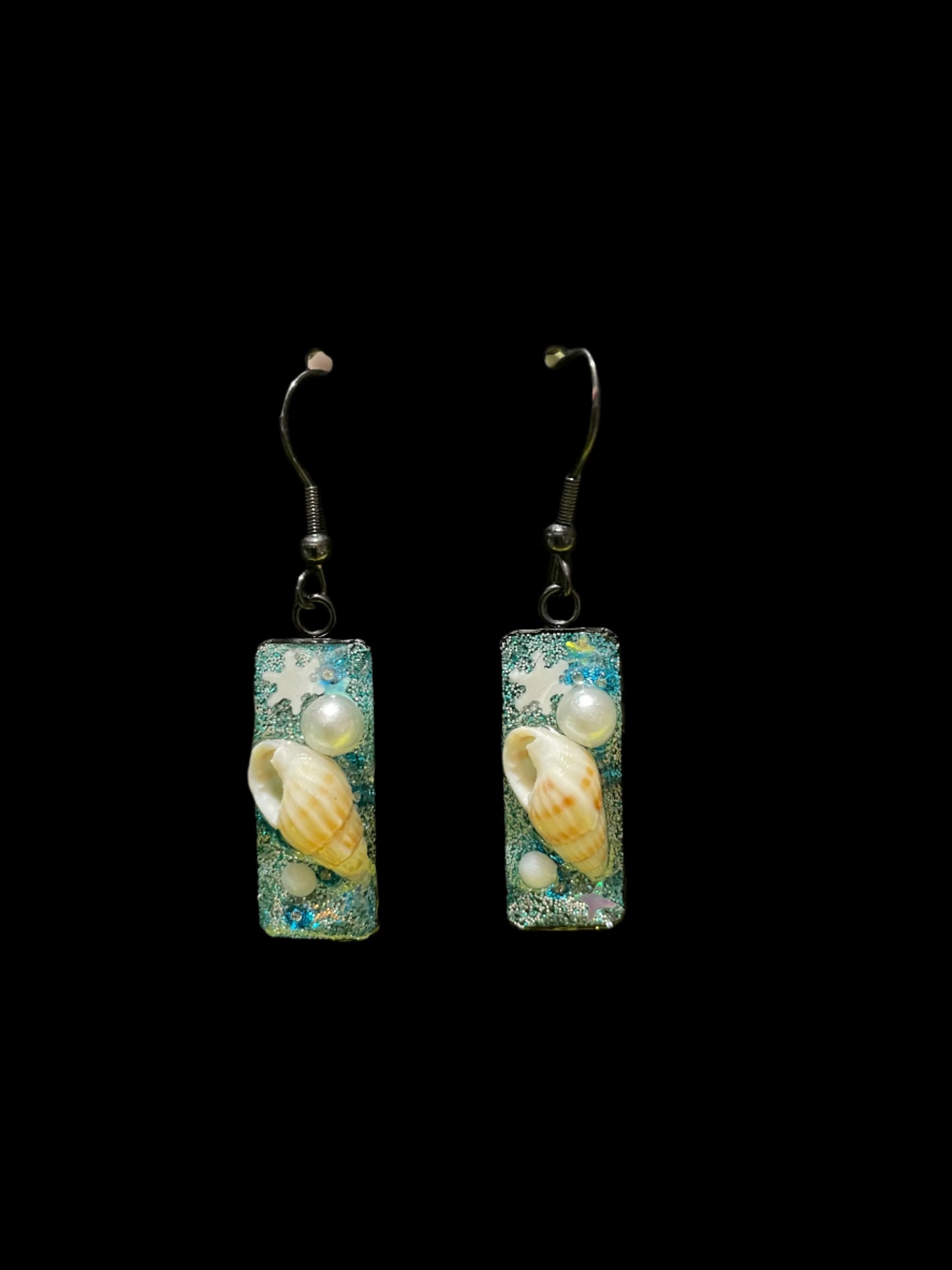 Snowflake and shell earrings