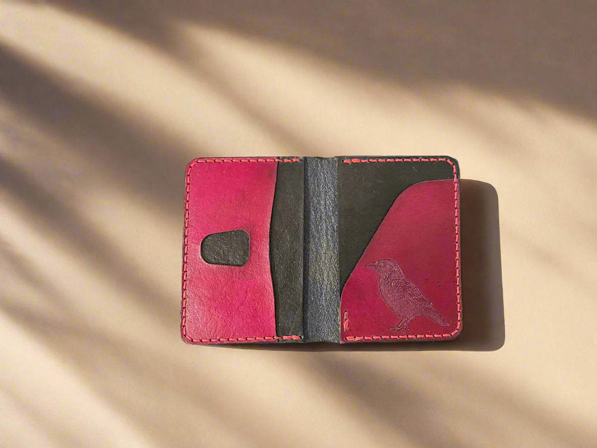 Red and Black Handmade Leather Wallet with a Raven top view