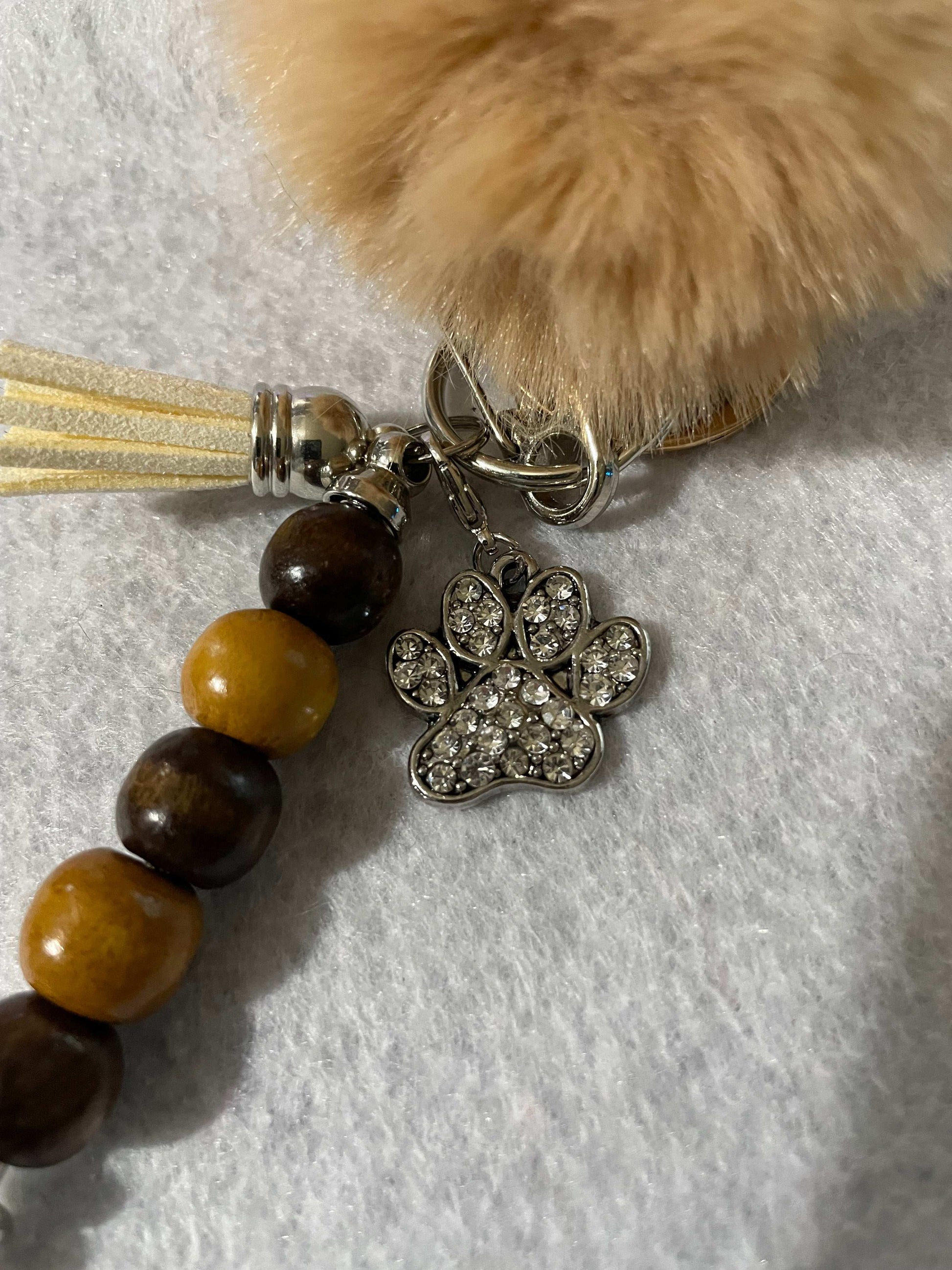 Animal Pay Keychain with wooden beads close up